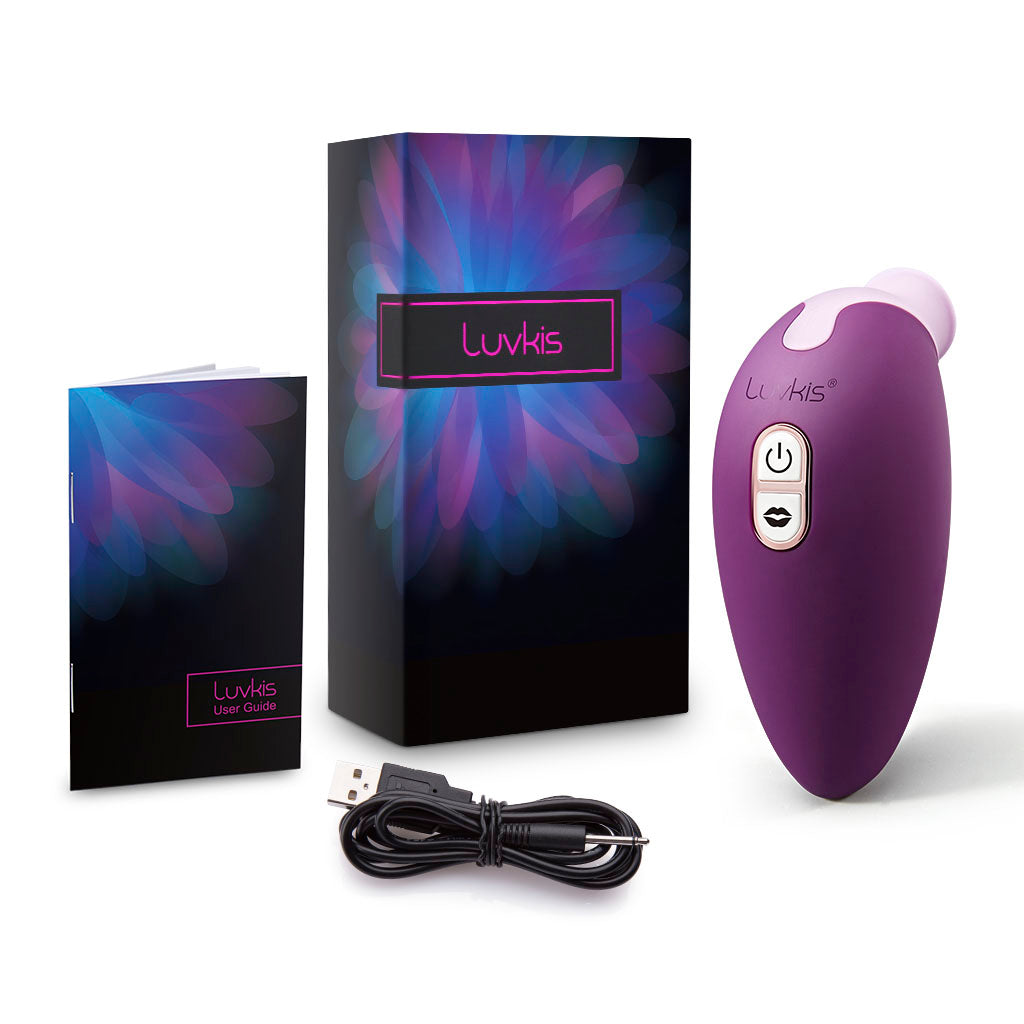 A purple clitoral and nipple stimulator with a realistic tongue design, alongside its packaging and USB charging cable.