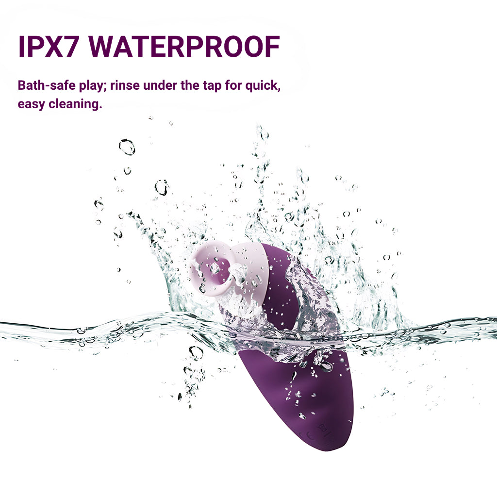 A product image of the purple Luvkis clitoral stimulator splashing in water, highlighting its IPX7 waterproof feature for bath-safe play and easy cleaning.